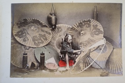 Lot 64 - Japan. A concertina album of 50 colour tinted albumen prints