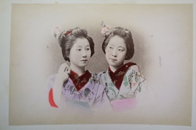 Lot 64 - Japan. A concertina album of 50 colour tinted albumen prints