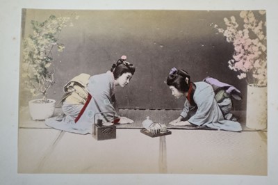 Lot 64 - Japan. A concertina album of 50 colour tinted albumen prints
