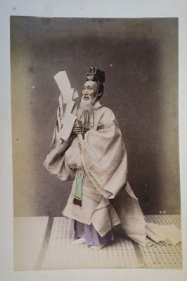 Lot 64 - Japan. A concertina album of 50 colour tinted albumen prints