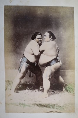 Lot 64 - Japan. A concertina album of 50 colour tinted albumen prints