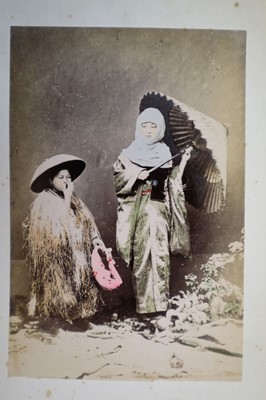 Lot 64 - Japan. A concertina album of 50 colour tinted albumen prints