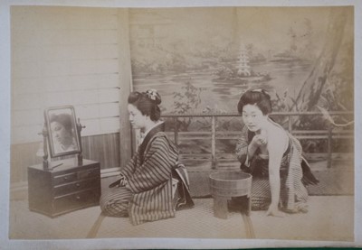 Lot 64 - Japan. A concertina album of 50 colour tinted albumen prints