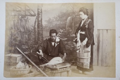 Lot 64 - Japan. A concertina album of 50 colour tinted albumen prints