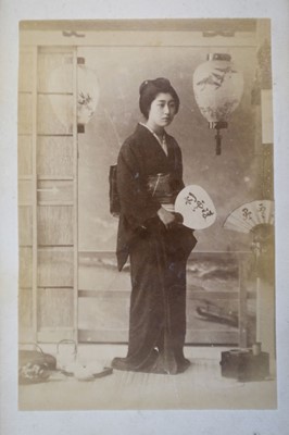 Lot 64 - Japan. A concertina album of 50 colour tinted albumen prints