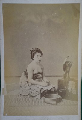 Lot 64 - Japan. A concertina album of 50 colour tinted albumen prints