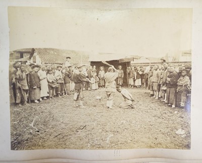 Lot 58 - Hong Kong. An album of 50 photographs of Hong Kong and Japan