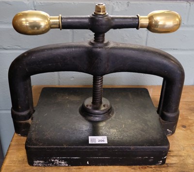 Lot 206 - Bookpress. A cast iron bookpress