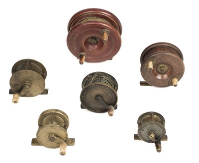 Lot 195 - Fishing Reels. A collection of brass and wooden reels
