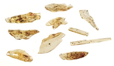 Lot 182 - Copal Amber. Three cased groups of amber