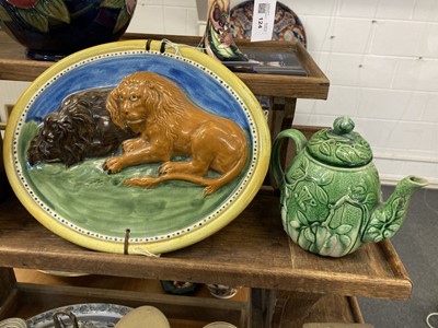 Lot 120 - Majolica. 19th-century pottery wall plaque and teapot