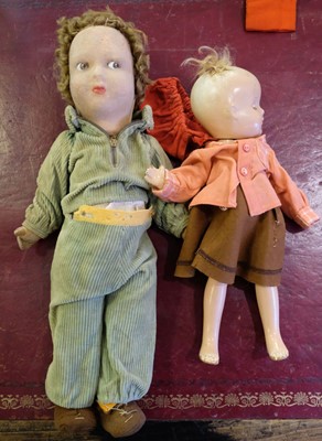 Lot 515 - Dolls. A slave doll, late 19th century, & others