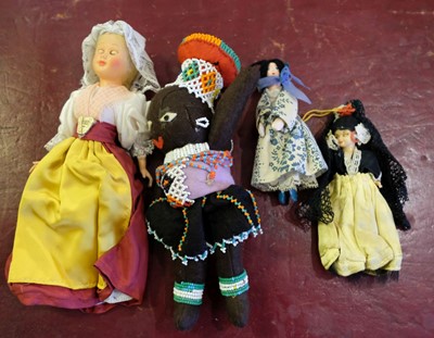 Lot 515 - Dolls. A slave doll, late 19th century, & others