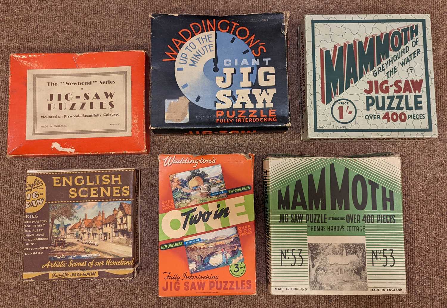 Lot 523 - Jigsaw Puzzles. A collection of 19 jigsaw puzzles, early 20th century