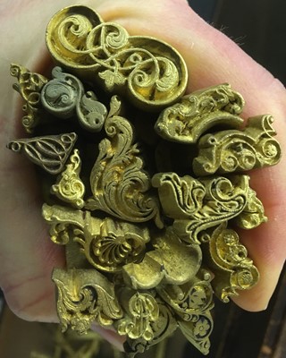 Lot 344 - Decorative finishing tools. A collection of approximately 180 brass decorative finishing tools