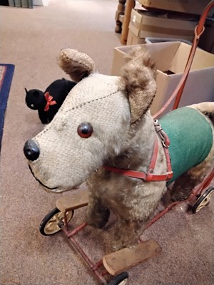 Lot 519 - Toy animals on wheels. Pedigree Soft Toys push along terrier dog, late 1950s-early 1960s, & others