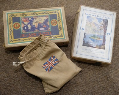 Lot 514 - Dolls. A bisque head doll, French, early 20th century, & other dolls and jigsaws