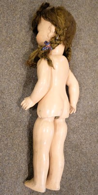 Lot 514 - Dolls. A bisque head doll, French, early 20th century, & other dolls and jigsaws