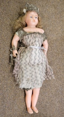 Lot 514 - Dolls. A bisque head doll, French, early 20th century, & other dolls and jigsaws