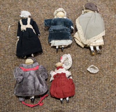 Lot 514 - Dolls. A bisque head doll, French, early 20th century, & other dolls and jigsaws