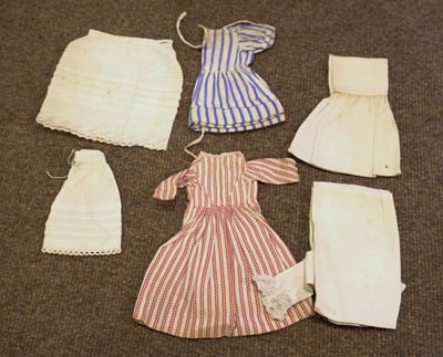 Lot 514 - Dolls. A bisque head doll, French, early 20th century, & other dolls and jigsaws