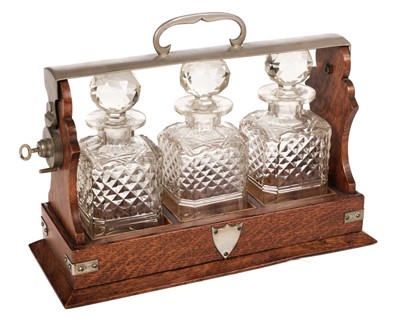 Lot 354 - Tantalus. An Edwardian tantalus