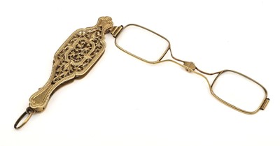 Lot 380 - Lorgnette. A pair of French yellow metal lorgnette circa 1900
