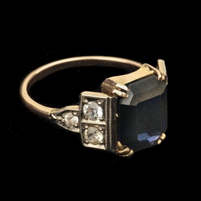 Lot 369 - Dress Ring. An Art Deco yellow and white metal ring
