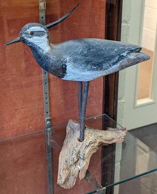 Lot 94 - Bird decoys. A group of 8 French painted wooden bird decoys, 1950s
