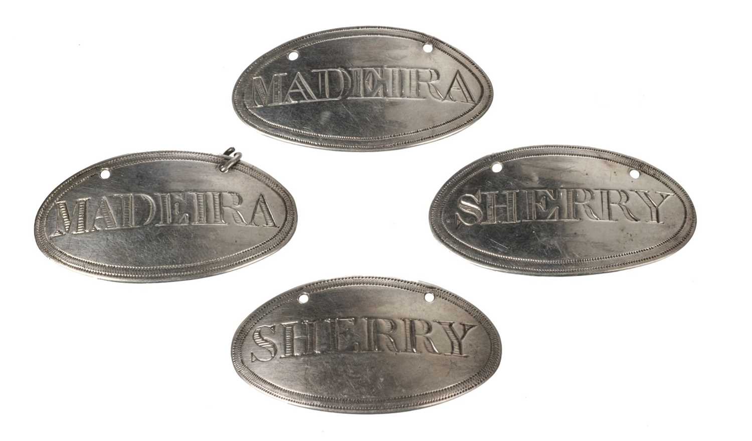 Lot 3 - Wine Labels. A matched set of George III silver wine labels