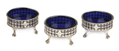 Lot 432 - Salt Cellars. Three George III silver salt cellars by Robert Hennell, London 1773 & 1774