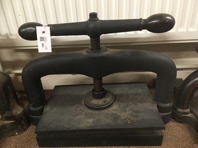 Lot 501 - Book press. A cast iron book press