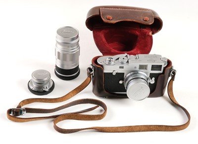 Lot 187 - Leica M2 rangefinder camera with three lenses, MR lightmeter and other accessories