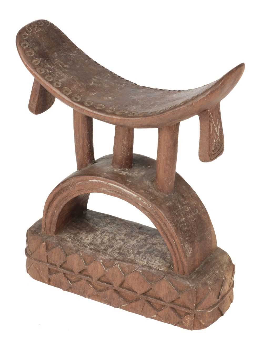 Lot 51 - Mozambique. A Tsonga carved wood headrest