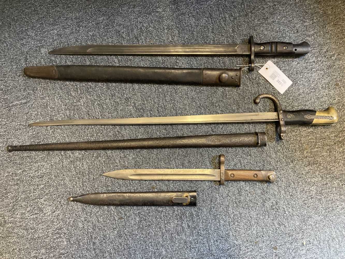 Lot 287 - Bayonets. A WWI American 1913 pattern Remington bayonet and two others