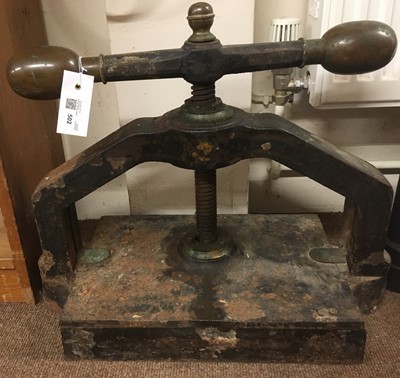 Lot 502 - Book press. A cast iron book press