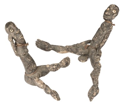 Lot 55 - Tribal Art. A pair of African wooden fertility dolls