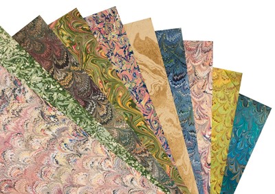 Lot 504 - Marbled paper. An assortment of machine printed marbled papers