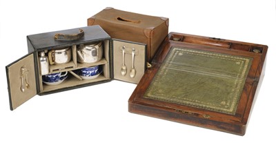 Lot 25 - Motoring Tea Service. An Edwardian travelling tea service plus a writing box