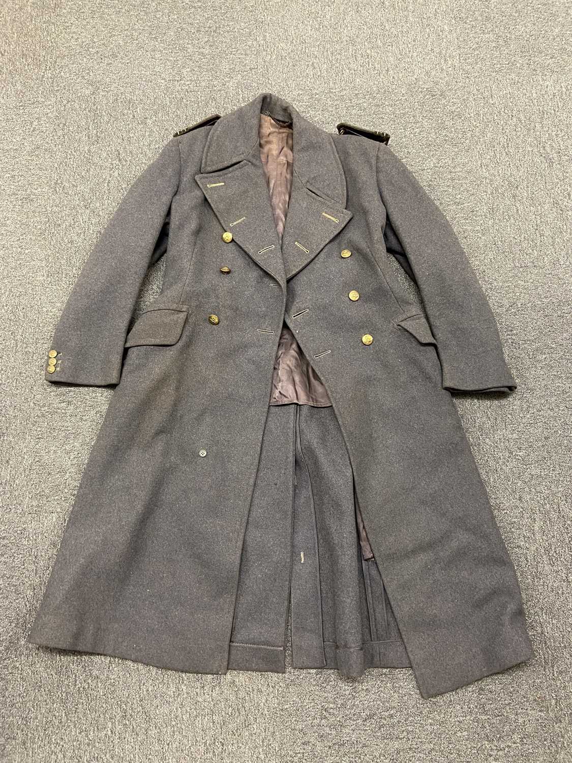 Lot 245 - RAF Greatcoats. A WWII period RAF greatcoat worn by Squadron Leader and other items