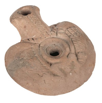 Lot 122 - Egypt. An ancient Egyptian oil lamp, frog type 2nd -4th century