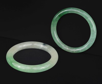 Lot 492 - Jade. Two Chinese jade bangles