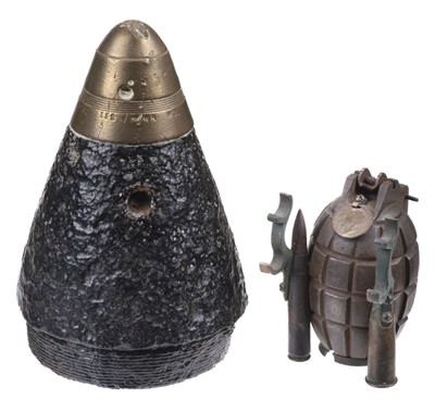 Lot 58 - Trench Art. A shell case projectile in relic form with a printed label 'Battle of the Somme'