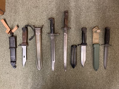 Lot 65 - Bayonets. A Garrand bayonet and others