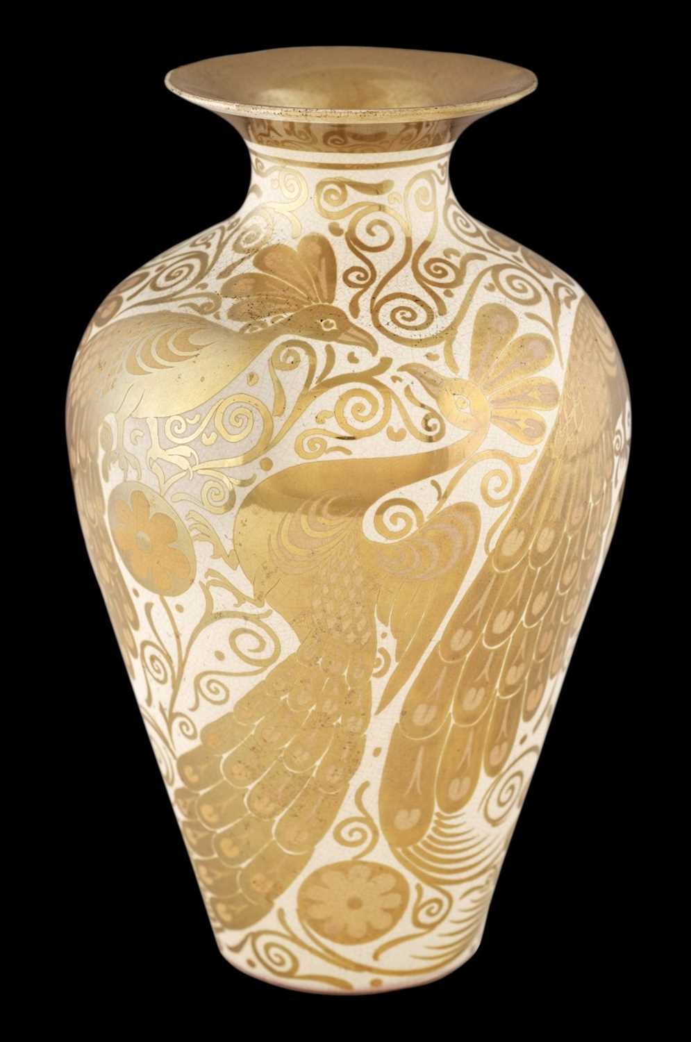 Lot 419 - De Morgan (William, 1839-1917). An early Fulham period silver lustre baluster pottery vase