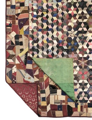 Lot 679 - Quilt. A silk patchwork quilt, mid 19th century