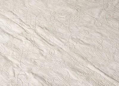 Lot 680 - Quilt. A trapunto bedcover, early 18th century