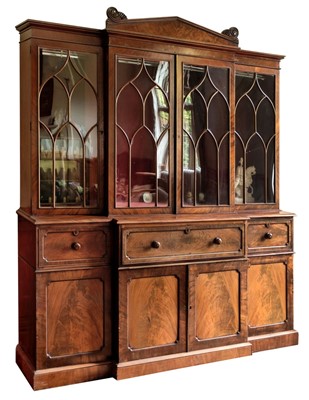 Lot 578 - Bookcase. A George IV period mahogany breakfront bookcase circa 1825