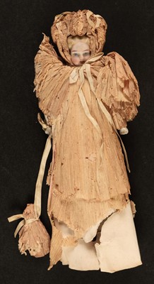 Lot 454 - Doll. A rare china head crêpe paper doll, possibly German, mid-19th century