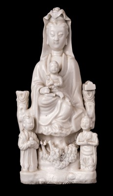 Lot 8 - Blanc de Chine Guanyin porcelain figural group, Qing, circa 1670